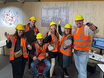 Teilnehmende nach Beendigung des Escape-Rooms