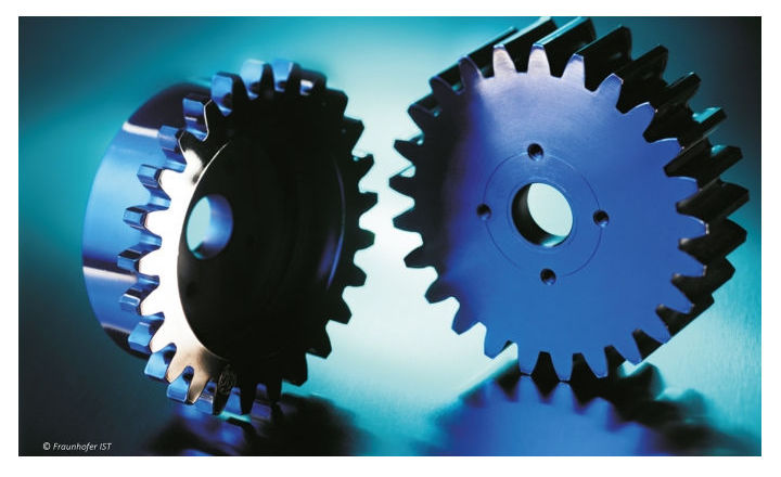 Maschinenbau Header 2 blaue Zahnräder